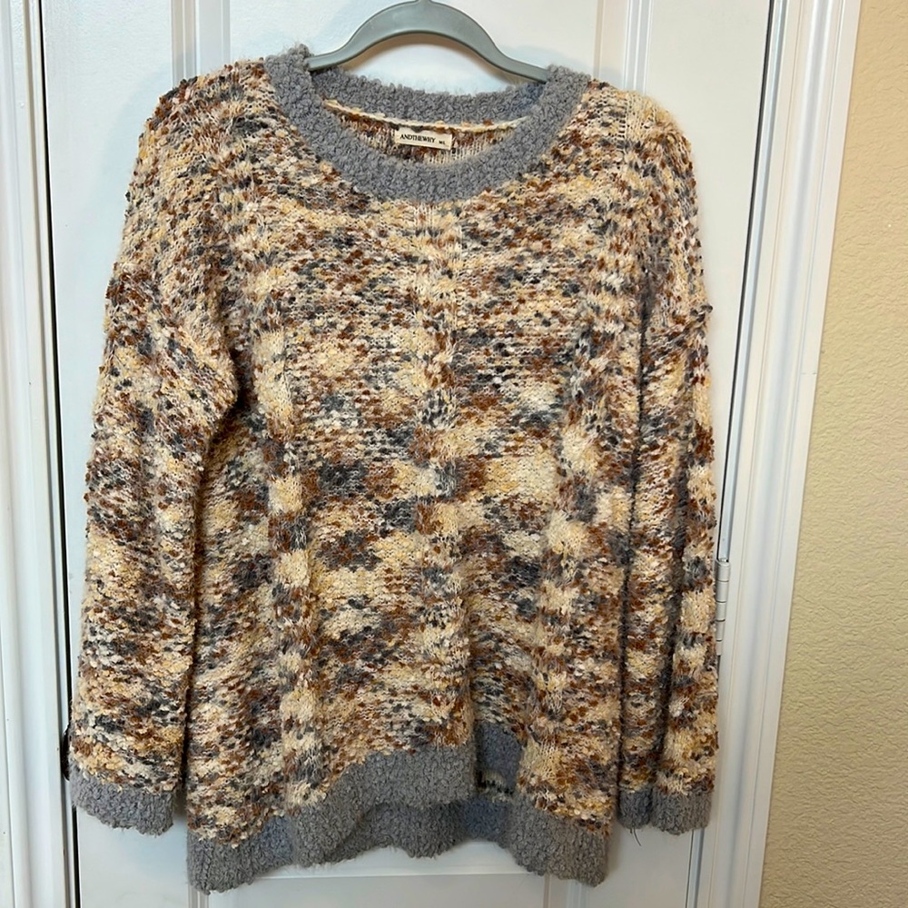 Knobby, shaggy sweater with slight bell sleeves. Neutral: cream, light grey, tan